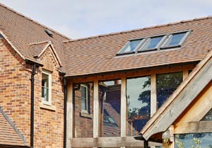 Oakframe selfbuild Collingwood tiles with Furness Bricks Ember blend 300wide